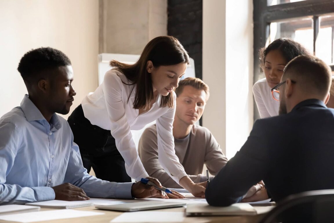 Team collaborating around a table