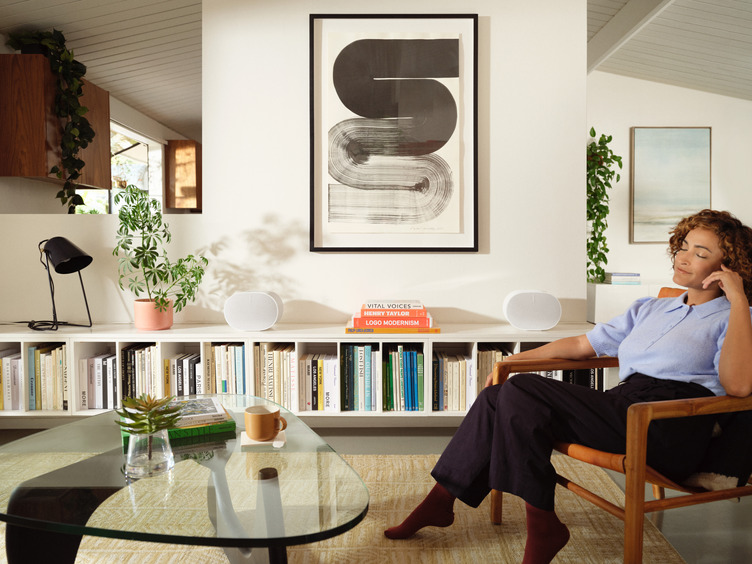 Sonos Era 100 speakers in a living room